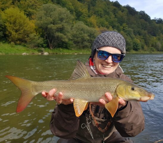 Girls fly fishing in Poland. Wife fishing - barbel