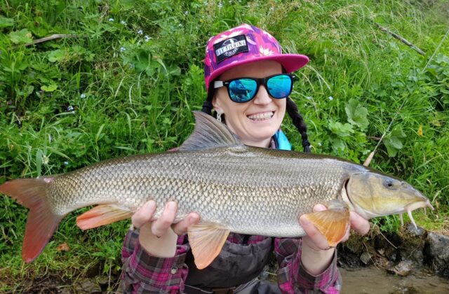 Girl fly fishing - Patagonia shirt brings luck